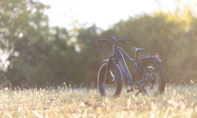 Young Brand Off-Road E-bike navigating a rugged mountain trail